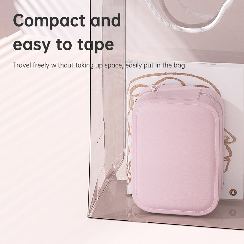 Compact pink travel toiletry bag inside a clear transparent organizer pouch