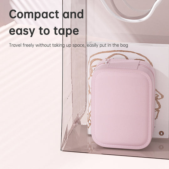 Compact pink travel toiletry bag inside a clear transparent organizer pouch