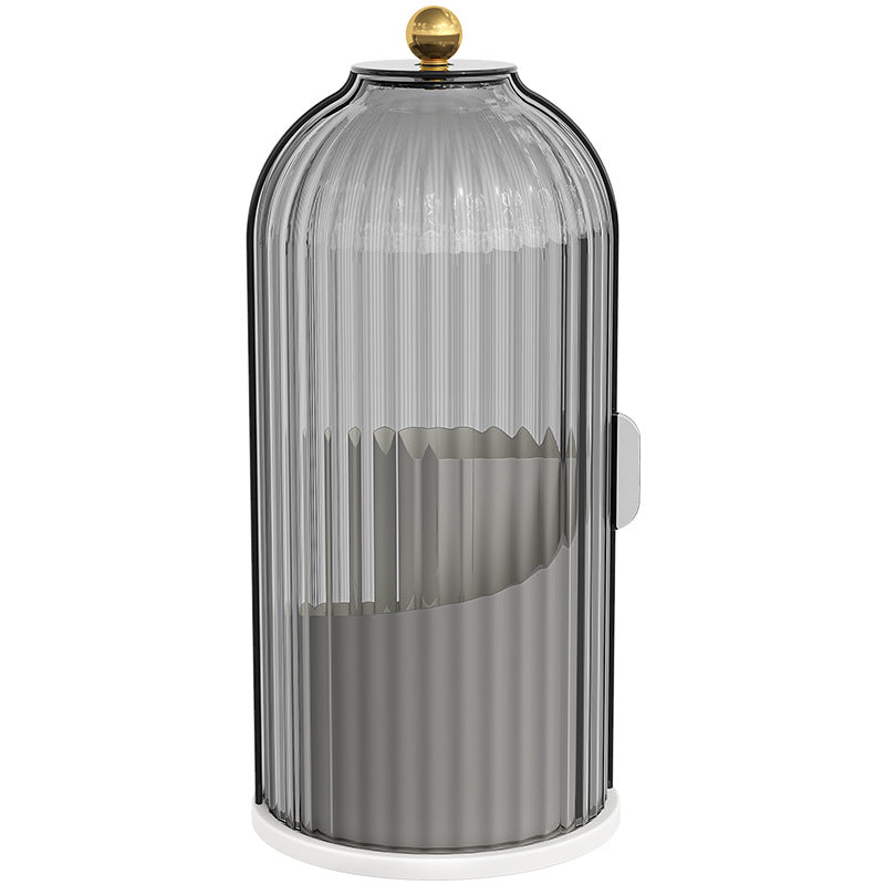 Elegant ribbed grey glass cloche with a gold knob finial on a white base.