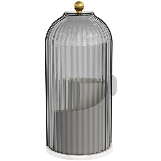 Elegant ribbed grey glass cloche with a gold knob finial on a white base.